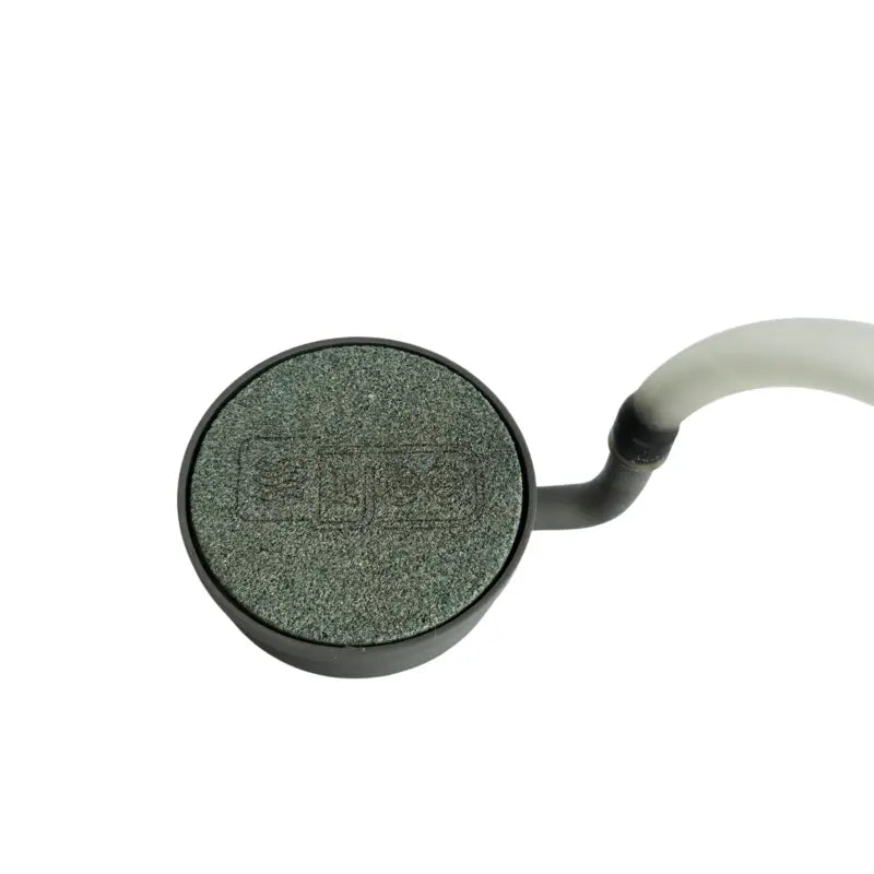 Aquager nano-pore air stone in use diffusing oxygen bubbles in hydroponic reservoir