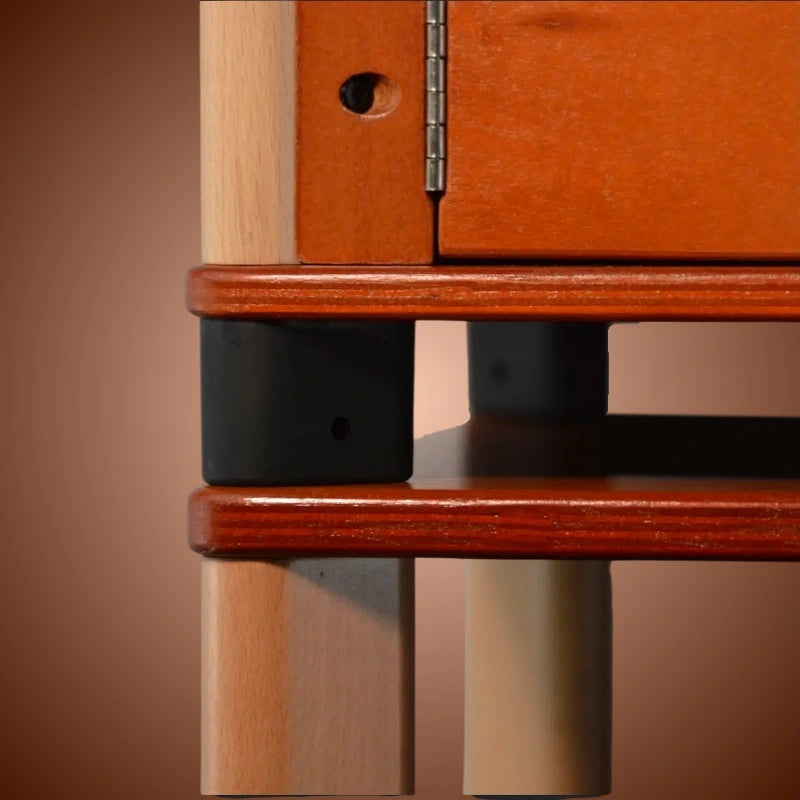 Close-up of a wooden hydroponic home farm with a hinge and black feet stacked.