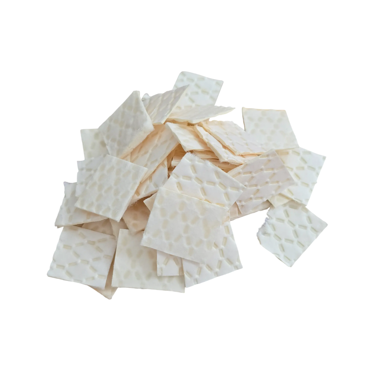 A loose pile of square hydroponic grow mats with a quilted diamond-stitch texture