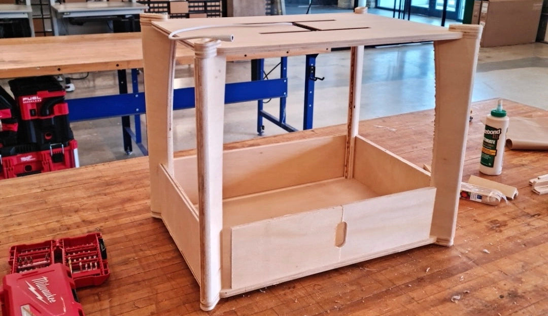 Wooden frame on a workbench in an industrial setting