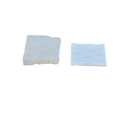 Two square hydroponic grow mats side by side, one smooth and one with a quilted diamond-stitch texture