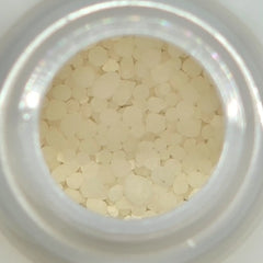 Awesome Plant Food concentrate granules, macro close up inside the bottle